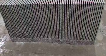 濮阳芝麻白毛板荒料切割